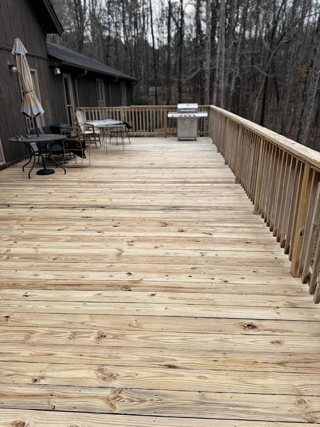 Long wood deck and railing after cleaning and restoration, Birmingham metro